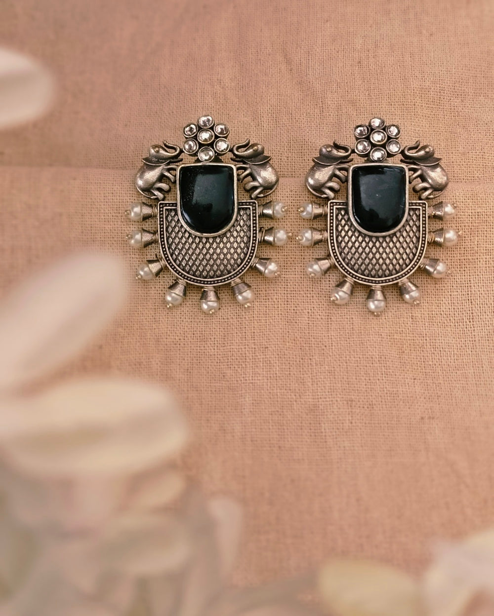 Raksha Studs
